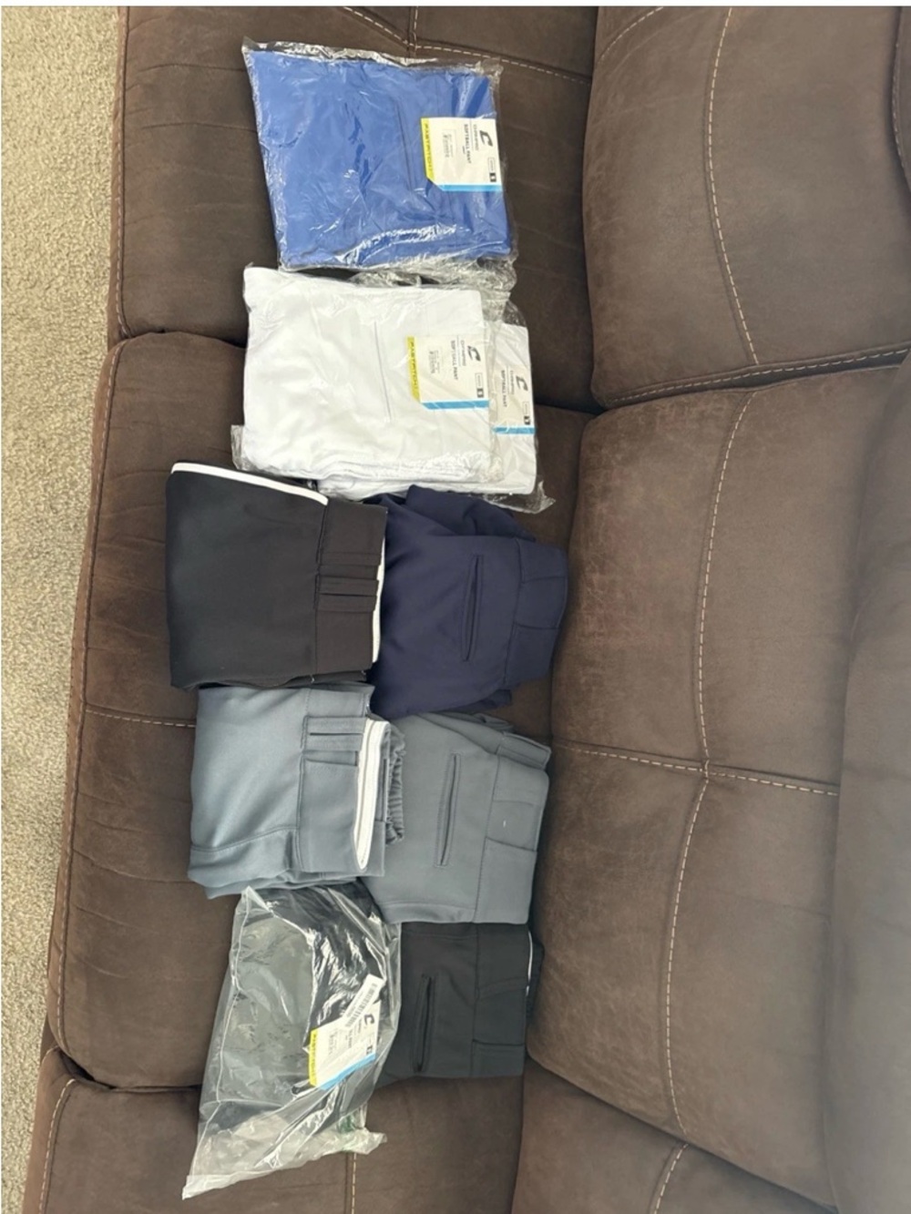 9 pairs women’s size small Champro brand softball pants